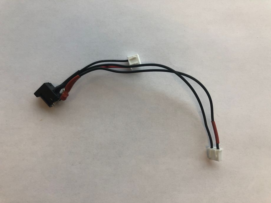 The new barrel connector with leads soldered on. The new barrel connector with leads soldered on.